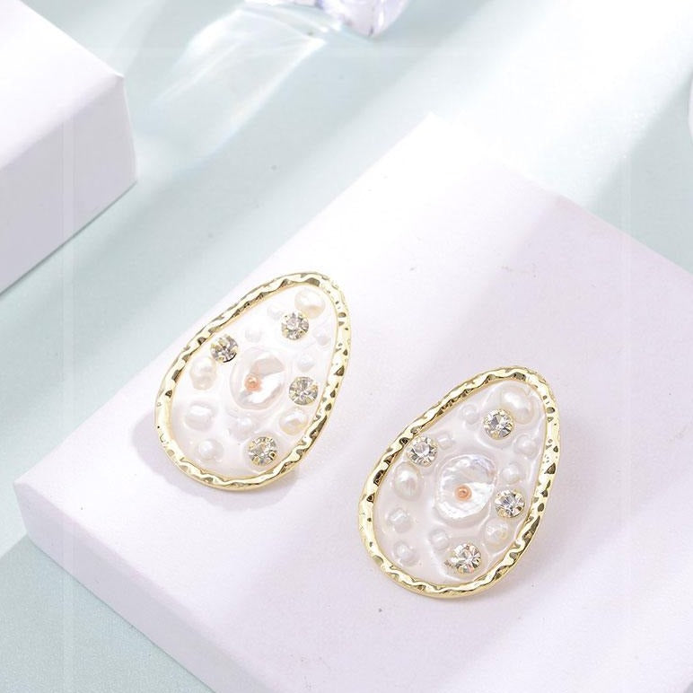 Translucent Pear Shaped Pearl Stud Earrings